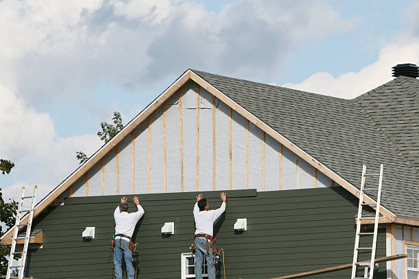 Professional Siding Installation technician working in North Reading, MA